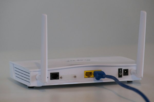 How to configure a secure Wi-Fi network for IoT devices using a TP-Link Archer AX1500 router?